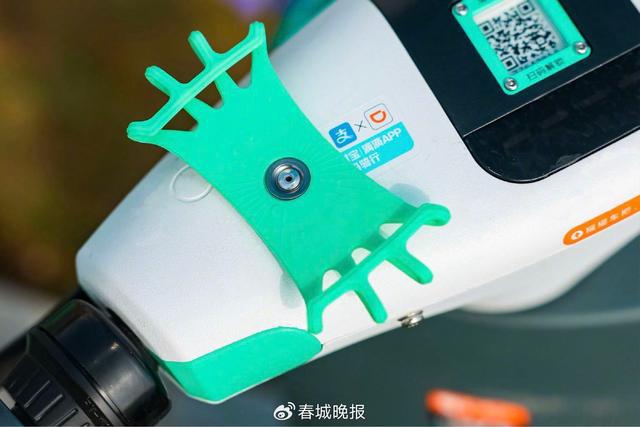 架”再升级提升昆明用户骑游体验九游会滴滴青桔电单车“手机支(图3)